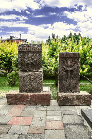 Medieval tombstones stone carved cross on the territory of the Church of Martyr Gayane in Etchmiadzinの写真素材