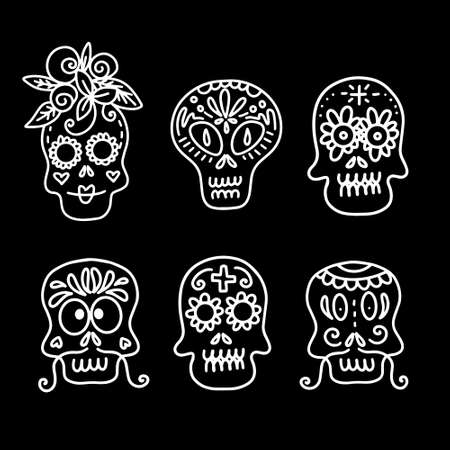 set of vector illustrations of decorated skullsのイラスト素材