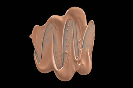 Smudged liquid make-up base isolated on a black background