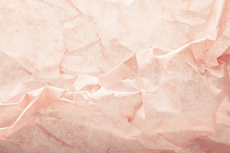 Crumpled baking paper pastel or tracing paper items background for objectsの写真素材