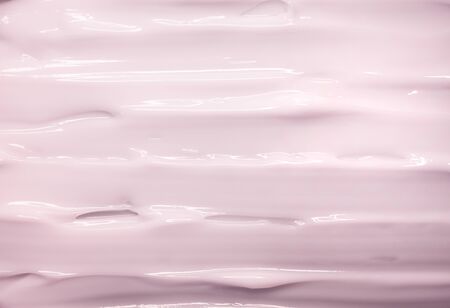 Liquid crem gel cosmetic smudge pink textureの写真素材