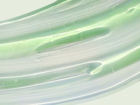 Cosmetic transparent cream gel texture smudge backgroundの写真素材