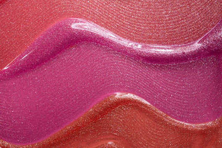 Glossy multi colored lipstick background texture smudgedの写真素材