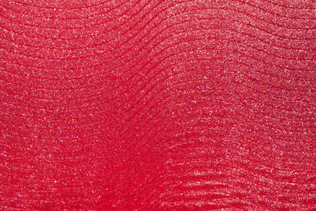 Glossy coral lipstick background texture smudgedの写真素材