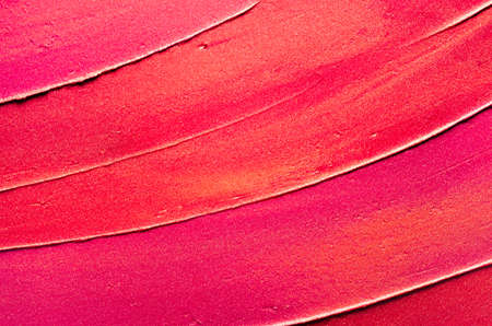 Glossy multi colored lipstick background texture smudgedの写真素材