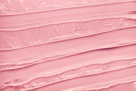 Pink cosmetic texture closeup as background, makeup and skincare productの写真素材