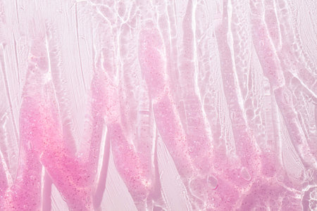 Cream gel purple pink transparent cosmetic sample texture with bubbles isolated on white backgroundの写真素材