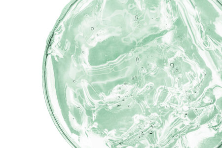 Water in a glass on a white background. Close-up.の写真素材