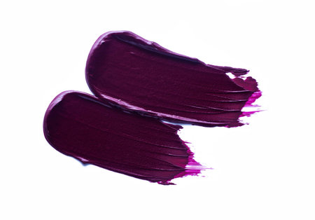 Lipstick abstract strokes smudges background texture multi colored purple burgundy isolated on white backgroundの写真素材