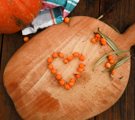 Pumpkin and sea-buckthorn autumn harvest.の写真素材