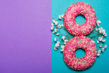 International Women's Day. Postcard for March 8. Flat lay. Donuts in the form of number 8.の写真素材