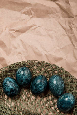 Easter eggs on a craft background. Place for textの写真素材