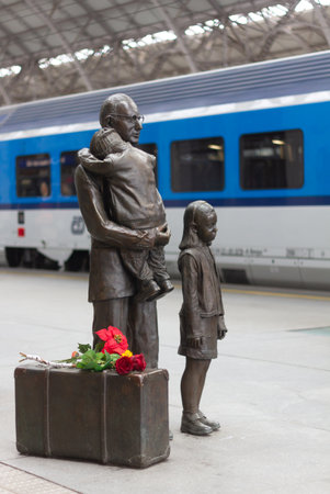 PRAGUE, MAIN TRAIN STATION, CZECH REPUBLIC - 23 march 2024 - Editorial: Statue of Nicholas Winton with children.の写真素材