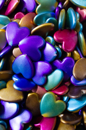 Colorful heart shaped beads background. Valentines Day celebration