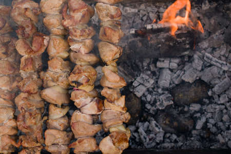 Cooking meat barbecue on skewers.の写真素材