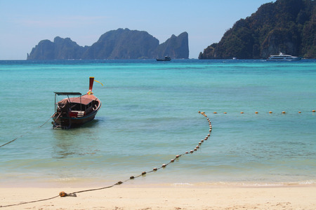 Krabi, Phi Phi island, Thailand. Sea view, yellow sand beach and boatのeditorial素材