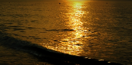Sunrise at golden sand beach.の写真素材