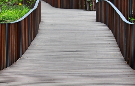 Beautiful wooden bridge, walk for flower gardenの写真素材