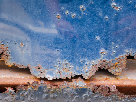 Grunge old crack and rusty metal plate texture blackground, rusty car close up,の写真素材