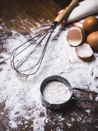 Pastry Baking Accessories Bakery Background with flour and whisk.の写真素材