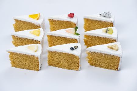 Delicious creamy minimal white cake with fruit.の写真素材