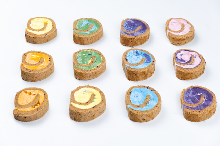 Delicious creamy colourful minimal cake roll.の写真素材