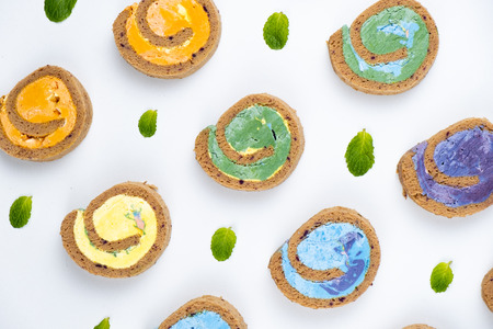 Delicious creamy colourful minimal cake roll.