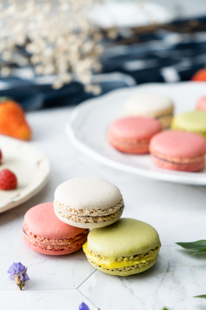 Macaron cookies dessert. Set on cafe table.の写真素材
