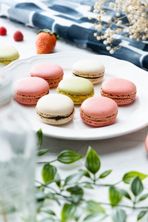 Macaron cookies dessert. Set on cafe table.の写真素材