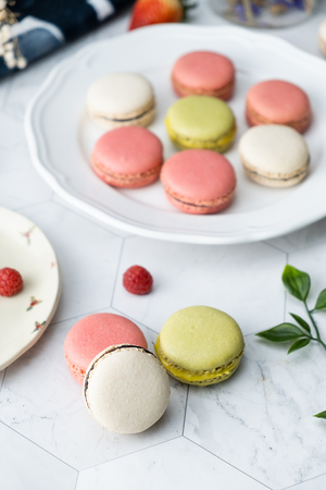 Macaron cookies dessert. Set on cafe table.の写真素材
