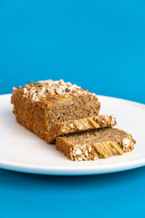 Almond bread loaf with Almond diced and Banana sliced.の写真素材