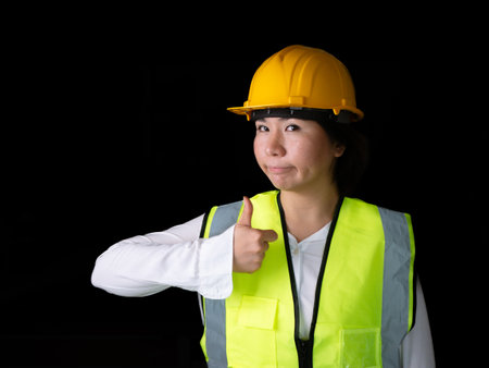 factory woman workers or technicians civil Engineer or Architecture project management give thumb up.の写真素材