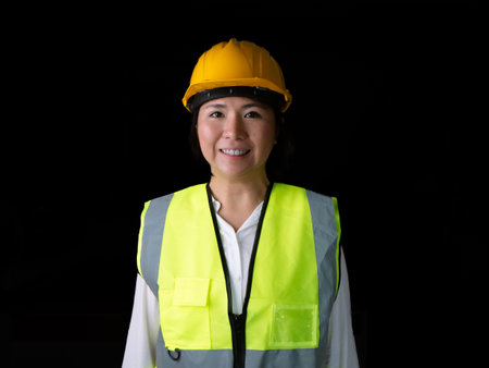 factory woman workers or technicians civil Engineer or Architecture project management smile at camera.の写真素材