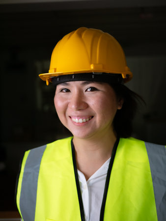 factory woman workers or technicians civil Engineer or Architecture project management smile at camera.の写真素材