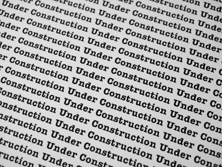 Words Under Construction Seamless print on paper for business background.の写真素材