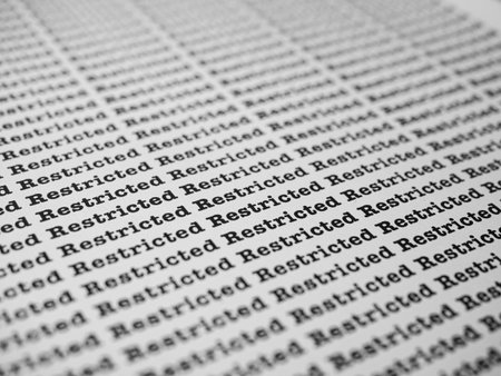 Words Restricted Seamless print on paper for business background.の写真素材