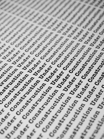 Words Under Construction Seamless print on paper for business background.の写真素材