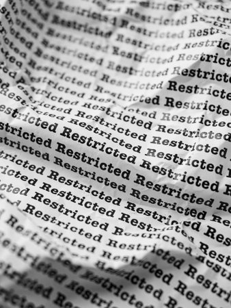 Words Restricted Seamless print on crumpled paper for business background.の写真素材