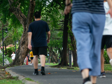 Blurred Runner, Jogger in Public Park, Active Lifestyle Background