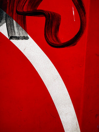 Abstract Grunge Graffiti Brush Strokes on Red Metal Surface.の写真素材