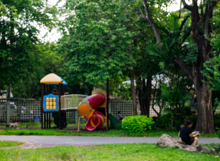 Blurred Playground in Public Park Background.