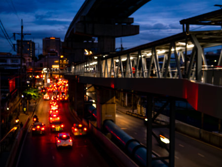 Traffic Light Trails at Twilight from Pedestrian Bridge - Urban Rush Hour with Motion Blur and City Skylineの写真素材