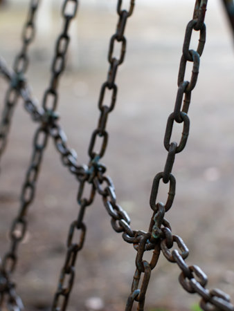 Old Weathered Metal Chain Link Connection Close-Up - Rusty Industrial Security Detail