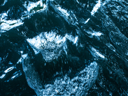Turbulent Dark Blue Water with White Foam and Splashing Waves - Dynamic Ocean Surface Texture