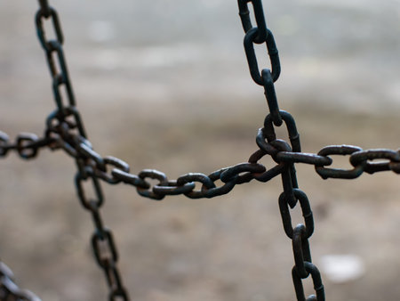 Old Weathered Metal Chain Link Connection Close-Up - Rusty Industrial Security Detail