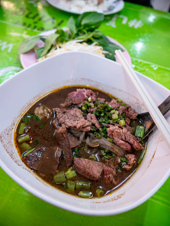 Traditional Thai Beef Noodle Soup with Rich Broth and Fresh Herbs