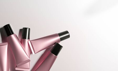 Tubes  - 3d render illustration. Blank face cream - Rose Gold tube, black cap. Cosmetics lie on light background. Advertising mockup with copy space. Set of trendy realistic skin or hair care cream.の写真素材