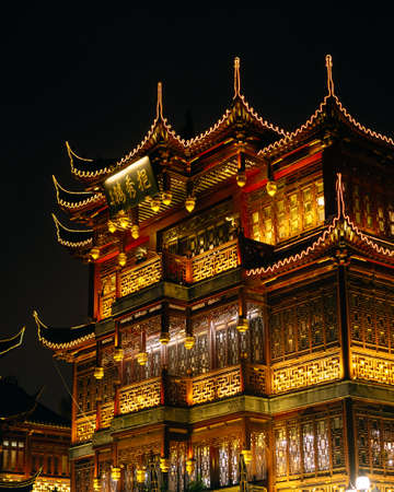 Shanghai, China; Nov 28 2017: Traditional chinese temple at night with neon lights