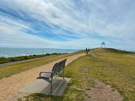 A view of a bench at the entrance to the North Sea.の写真素材