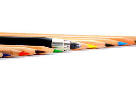 some coloured crayons and the big oneの写真素材